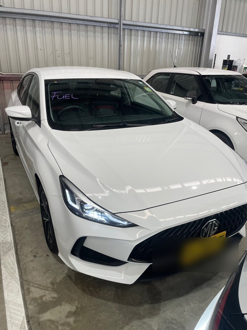 Modern MG sedan in the Titan Automotive Locksmiths workshop awaiting proximity key programming